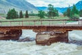 old wooden bridge over the river Royalty Free Stock Photo