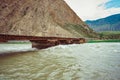 old wooden bridge over the river Royalty Free Stock Photo