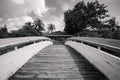 Old wooden bridge in the park black and white Royalty Free Stock Photo