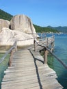 The old wooden bridge beside the sea Royalty Free Stock Photo