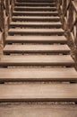 Old wooden bridge with stairs in forest. Staircase in the wood. Adventure and explore concept Royalty Free Stock Photo