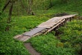 Old wooden bridge with their hands in the village in a poor country Royalty Free Stock Photo