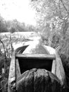 Old wooden broken boat for swimming on banks water in natural reeds Royalty Free Stock Photo