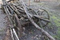 An old wooden broken cart with slabs