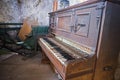 Old wooden broken piano. Abstract inside retro photo
