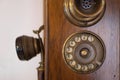 Old wooden brown phone on the wall Royalty Free Stock Photo