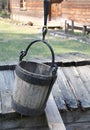 The old wooden bucket in the historical village