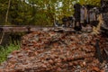 The old wooden burned-down house a view of brick wall from inside Royalty Free Stock Photo