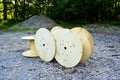 Old wooden cable bobbin discarded in a forest in bavaria, germany