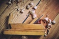 Old wooden carpenters tool plane on a wooden background Royalty Free Stock Photo