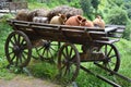 Old wooden cart with clay jugs Royalty Free Stock Photo