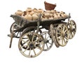 Old wooden cart full of clay pottery, wheels and wicker basket i Royalty Free Stock Photo