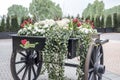 Old wooden cart full colorful flowers with flower text Royalty Free Stock Photo