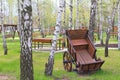 Old wooden cart in garden Royalty Free Stock Photo