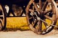 An old wooden cart sits in the field, its wheels creaking with rust and age. This sight evokes memories of a simpler time, when