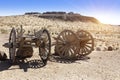 An old wooden cart on two wagon wheels in the Kyzyl desert, Uzbekistan Royalty Free Stock Photo