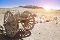 An old wooden cart on two wagon wheels in the Kyzyl desert, Uzbekistan Royalty Free Stock Photo