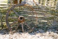 Old wooden cart wheel. The concept of outdated technologies, ecotourism Royalty Free Stock Photo