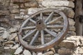 Old wooden cartwheel on a farm