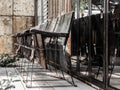 Old wooden chair Located in front of the old building. Royalty Free Stock Photo