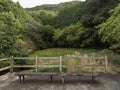 old wooden chairs in Japaness garden and mountain veiw background Royalty Free Stock Photo