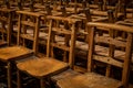 Old Wooden Chairs in Row in a Church Royalty Free Stock Photo
