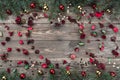 Old wooden Christmas background. Fir branches with baubles and gold stars. Space for heart-shaped Xmas congratulation text space Royalty Free Stock Photo