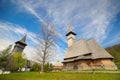 Old wooden church at Barsana Monastery in spring in Maramures county Royalty Free Stock Photo