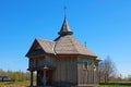 Old wooden church in the countryside against a blue sky Royalty Free Stock Photo