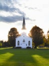 Old wooden church at sunset. Royalty Free Stock Photo