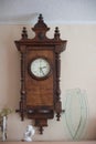 Old Wooden Clock on the Church Wall Royalty Free Stock Photo