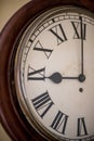 Closeup of an Old Wooden Clock Face Royalty Free Stock Photo