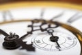 Old wooden clock with a pendulum hanging Royalty Free Stock Photo