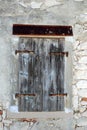Old wooden closed shutters in the island Susak Royalty Free Stock Photo