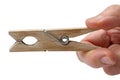 Old wooden clothespin in his hand Royalty Free Stock Photo