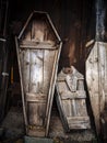 Old wooden coffins leaning in a shed Royalty Free Stock Photo