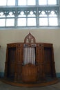 Old, wooden, confessional room keeping secret of a confession, christian attributes