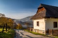 Old wooden cottage in village Vlkolinec in Slovakia. Autumn rural country Royalty Free Stock Photo