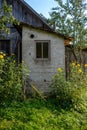 old wooden countryside toilet house with heart shaped hole in th Royalty Free Stock Photo