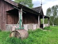 An old English cricket pavilion with roller