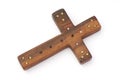 Old wooden cross decorated with beads isolated Royalty Free Stock Photo