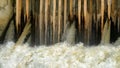 Old wooden dam is leaking and water gushes Royalty Free Stock Photo