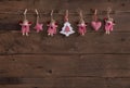 Old wooden dark brown christmas background with handmade red whi