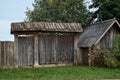 Old wooden dilapidated village house with gate Royalty Free Stock Photo