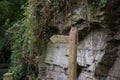 An old weathered public path wooden sign post