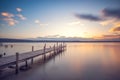 Old wooden dock at the lake, sunset shot Royalty Free Stock Photo