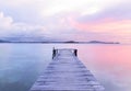 Old wooden dock at the lake, sunset shot Royalty Free Stock Photo
