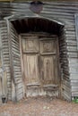 Old wooden door in an abandoned house. Royalty Free Stock Photo