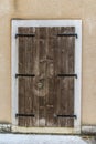 Old wooden door in ancient beautiful building Royalty Free Stock Photo