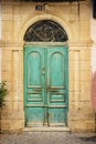 Old wooden door in ancient greek house. Crete Royalty Free Stock Photo